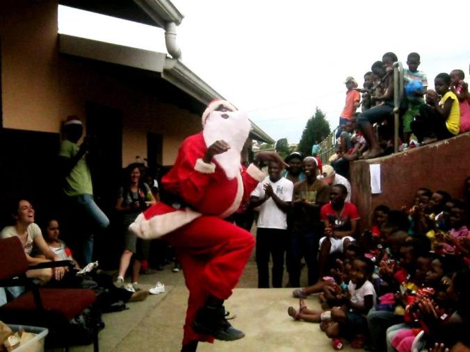 Baba Christmas (as Father Christmas is called here) dancing for the kiddies.